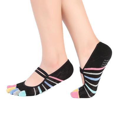 China Women's Colorful Antibacterial Cotton Five Toe Cross Strap Non Slip Silicone Skid Silicone Yoga Bangs Anti Slip Girls for sale