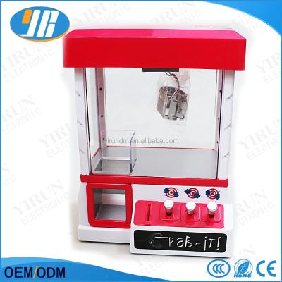 China Plastic Mini Crane Machine Toy Crane Machine Children's Game Console Coin Type Toy for sale