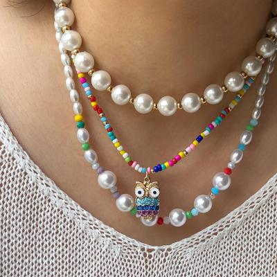 China TRENDY fashion colorful bead crystal pendant multilayer millet beaded necklace love patchwork necklace for sale