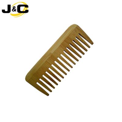 China Eco Friendly Hotel Use Home Bamboo Hair Comb And Disposable Wooden Hair Comb With Laser Logo for sale