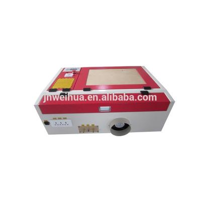 China Laser Engraving 40 Watt 4040 Small Laser Cutter 40w for sale