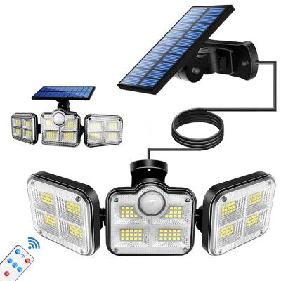 China Super Bright Garden Lights 122 LED Solar Outdoor Wide Angle Motion Sensor 3 Head Illumination Waterproof Remote Control Wall Lamp for sale