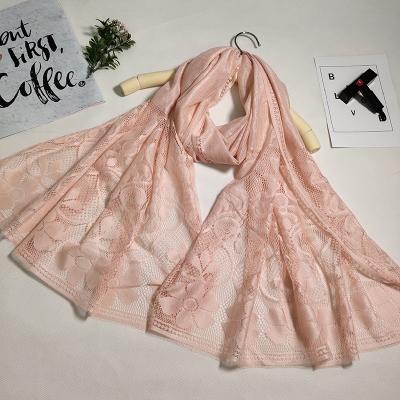 China Simple Dyed Lace Up Thin Cavity Gauze Travel Sunscreen Shawl Solid Color Ladies Silk Head Scarf Muslim Scarf for sale