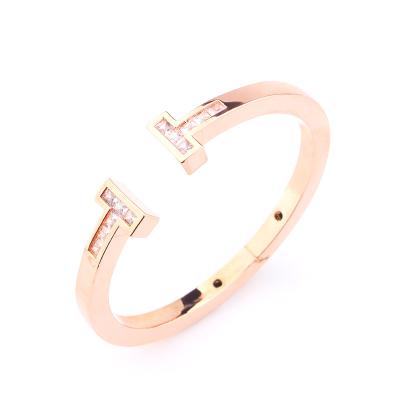 China Wholesale FASHIONABLE Elegant Gold Plated Healing Jewelry TT Charm Bracelet Crystals Stones Slap Bracelet For Women for sale