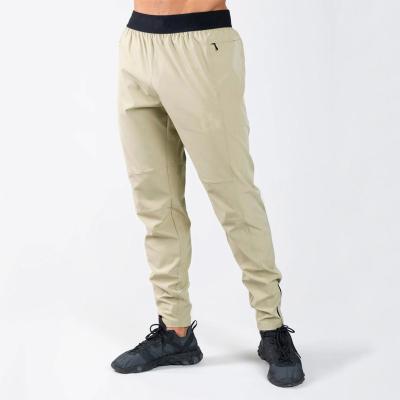 China Custom Elastic Waist Slim Fit Solid Fitness Sports Sweatpants Gym Jogger Jogger Training Pants For Men for sale