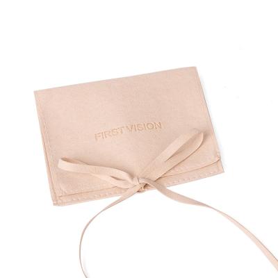 China Attractive Personalized Custom Suede Beige White Microfiber Microfiber Velvet Flap Jewelry Packaging Pouch With Bow Ribbon Insert For Boxes Sets for sale