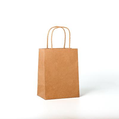 China Recycled Materials China Customized Printing Logo Colors T-shirt Apparel Jewelry Pouches Packaging Kraft Paper Bag With Rope For Jewelry for sale