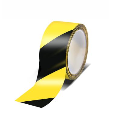 China Wholesale black and yellow waterproof adhesive bopp warning device safety floor warning marking tape for regional division for sale