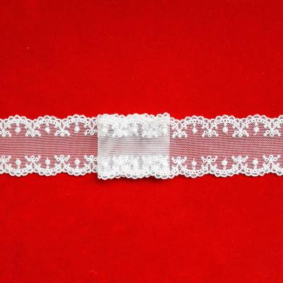 China Other Factory Outlet Cotton Carved Hole Embroidery Lace Mesh Fabric For Children's Clothing Fabric for sale