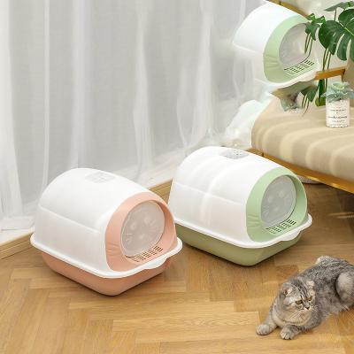 China Cat Toilet Anti-splash Viable Cats Tray Spoon Clean Kitty House Can Flip Cover Plastic Cat Litter Box Closed Sandbox Pet Bedpan for sale