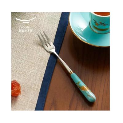 China Sustainable Hot Selling Unique Vintage Dinner Spoon Fork Ceramic Stainless Steel Handle Cutlery Set for sale