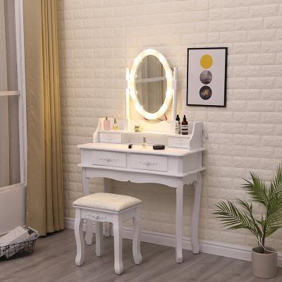 China Hot Sale Modern Designs 4 Drawers Bedroom Wooden Dressing Table Convertible With Led Mirror for sale