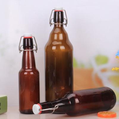 China Economic Glass Beverage Liquor 520ml Glass Bottle Shake Alcohol Bottle With Swing Top For Vodak Whishkey for sale