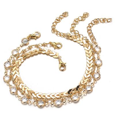 China 2021 Casual/Sports Hot Selling Bracelet Foot Jewelry Set Creative Arrowhead Crystal Beaded Anklet Chain Women Three-Layer Fish Bone Anklet Chain for sale