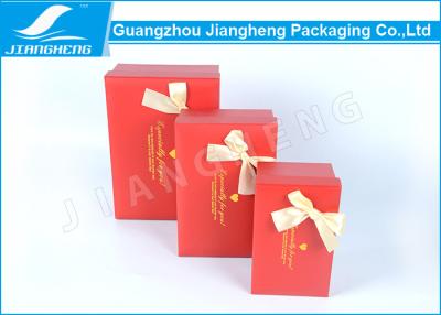 China Handmade Rigid Cardboard Gift Boxes Packaging Hot Stamping With Ribbon Bowknot for sale