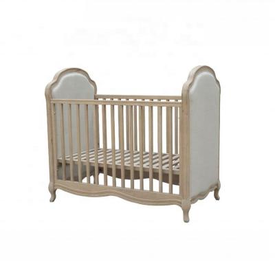 China Adjustable Size Antique Baby Crib European Provincial Handmade Bedroom Furniture Solid Wood Beige Canvas Crib for sale