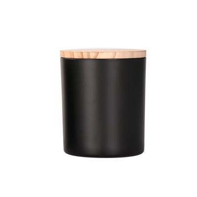 China Wholesale Colorful Frosted Black Empty Glass Home Decoration Amber Candle Jar With Bamboo Lid for sale