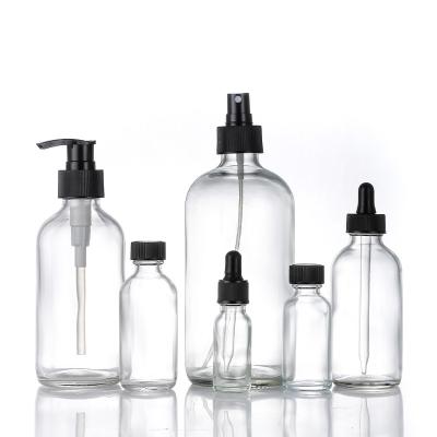 China Wholesale 1OZ 2OZ 4OZ 8OZ 16OZ Boston Round Glass Cosmetic Clear Bottle Spray Lotion Bottles for sale