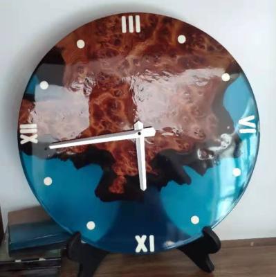 China Easy to clean custom small round corner table made of resin solid wood clock for sale