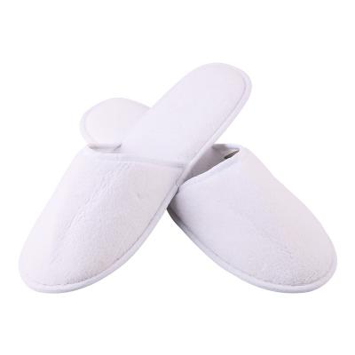 China Customized Coral Embroidery Soft Closed Toe Label Fleece Hotel Slipper for sale