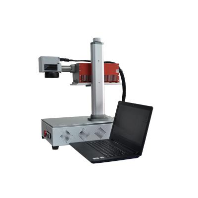 China Hot selling portable low power UV laser marking machine has no pollution, long service life and high precision for sale