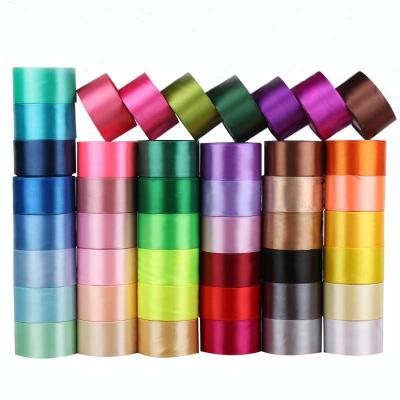 China 100% polyester front side double rpet single silk satin ribbon roll customized by factory viable wholesale for sale