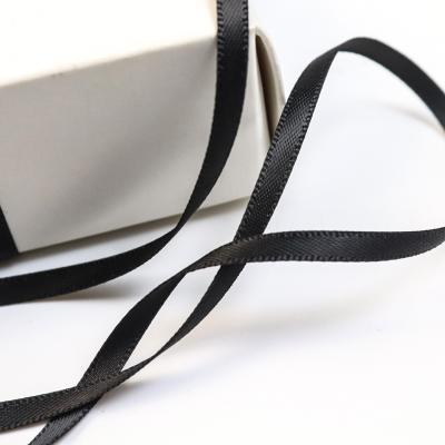 China Eco-Friendly RPET Recyclable Satin Double Face Satin Ribbon 3MM Black/White Ribbon For Garment for sale