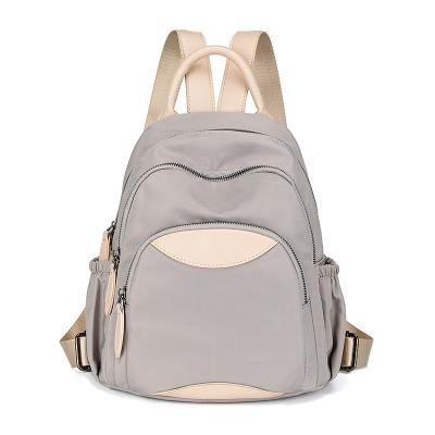 China New Large Capacity Oxford Cloth Zipper Backpack Female Anti-theft Classic Casual Girl Universal Student Bag Traveling Backpack for sale