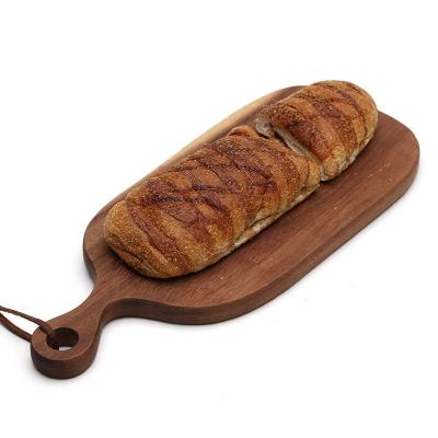 China Qingdao Sustainable Custom Premium Handmade Walnut Bread Board Pizza Steak Boards Fruit Cutting Board for sale