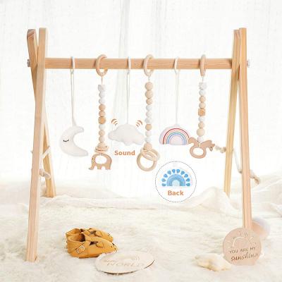 China Non-Toxic Wake Up Set Baby Play Gym Foldable Activity Gym with Wooden Baby Teether Toys Montessori Baby Play Gym Newborn Gift for sale