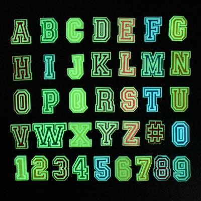 China 2021 Washable Custom PVC Number Letters Glow English Shoe Charms Light Up Shoes Decoration For Kids Croc Glowing In Dark for sale