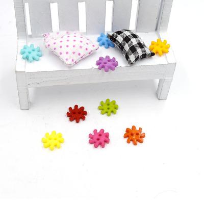 China Low Price Sustainable ABS Colorful Sun Flower Shaped Plastic Buttons For Kids Clothing DIY Handicraft for sale