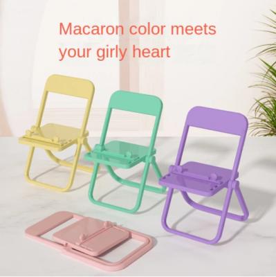 China Adjustable Universal Mobile Phone Accessories Mini Desktop Stand Table Cell Candy Chair Portable Phone Holder For iPhone Xiaomi Huawei for sale