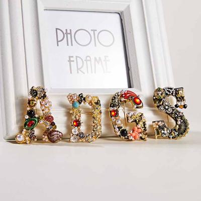 China Wholesale long lasting high quality ALLOY baroque brooch letter rhinestone letter brooch for sale