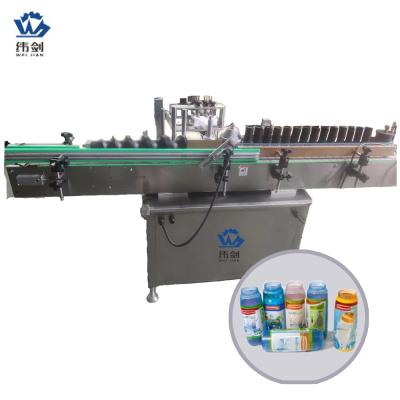 China automatic round bottle food labeling machine automatic wet glue labeling machine for sale