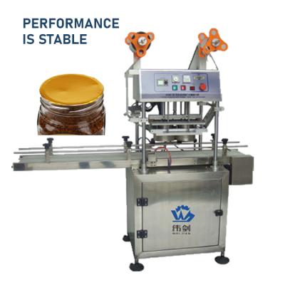 China Automatic Plastic Sealing Machine Aluminum Foil Beverage Bottle Capping Machine for sale