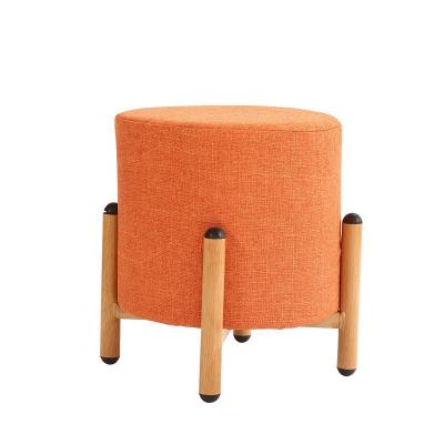 China Strong Safety Foldable Canvas Fabric Upholstered Round Wooden Foot Stool for sale