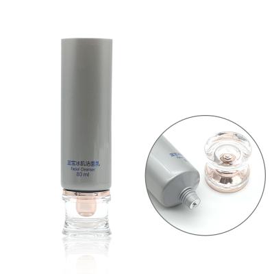 China Premium Custom Acrylic Slim Luxury Body Lotion Spa Lid Wash Facial Cosmetics Packaging Round Tube for sale