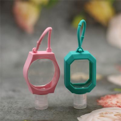 China Key Chain Portable Holder Eco-friendly Flip Cap Color 30ml Hook Silicone PET Empty Refillable Plastic Hand Sanitizer Alcohol Perfume Bottles for sale