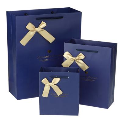 China Navy Bag Recyclable Custom Printing Paper With Bow For Clothes Package for sale