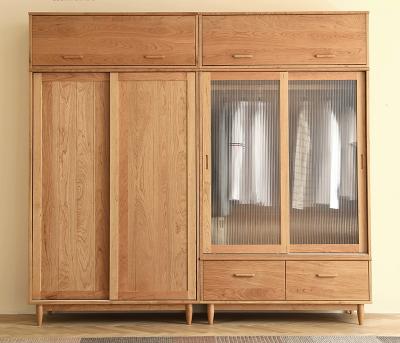 China Contemporary Nordic Modern Solid Wood Glass Log Wardrobe Cherry Wood Sliding Door All Household Bedroom Solid Wood Wardrobe for sale