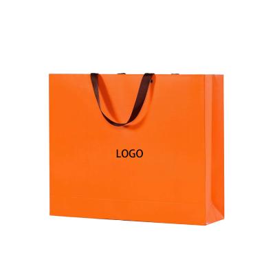 China OEM Recyclable Custom Printed Logo Colorful Shopping Paper Bag For Clothing for sale