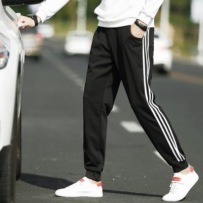 China QUICK DRY Accept Custom Jogging Pants Men Three Bars And Feet Jogging Pants Men Casual Jogging Pants for sale