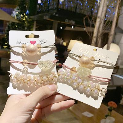 China Water Environmental Friendly Drill Bead Simplicity 3-Piece Rope Head Crystal Bow Hair Elastic Rope Bracelet for sale