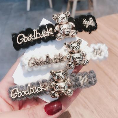 China Korea female cute fur winter woolen letter attractive side hair clip design/top quality hair accessories with bear for sale