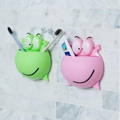 China Viable Cute Cartoon Frog Toothbrush Holder Kids Toothbrushes Storage For Bathroom Suction Cup Toothpaste Holder Rack for sale