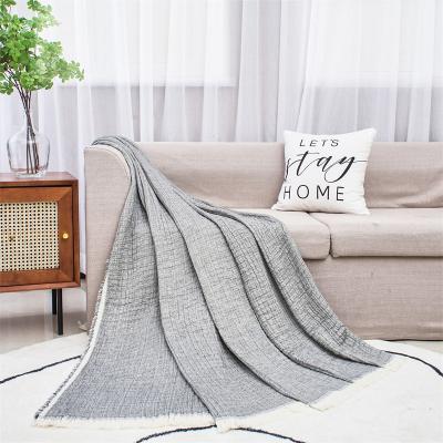 China Luxury LOGO Knitted Throw Bed Blanket Custom Made Anti-Static Pure Color Fashion Cotton Throw Blanket for sale