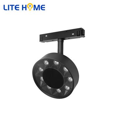 China Adjustable Led Track Lighting Fixture Magnetic Track Light System Modern Round White Black Aluminum 9w For Home Hotel for sale