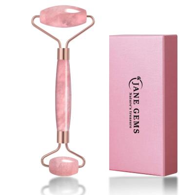 China Roller de jade de quartzo rosa de pedra de cristal para tratamento facial / eliminação de edema à venda