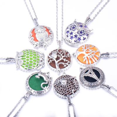 China Fashion 2022 Life Tree Patterns Pendant Locket Jewelry Chain Magnetic Perfume Necklace Aromatherapy Essential Oil Diffuser Necklace for sale